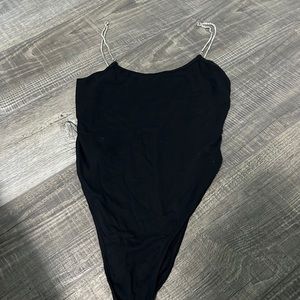Black shirt with sequenced strings